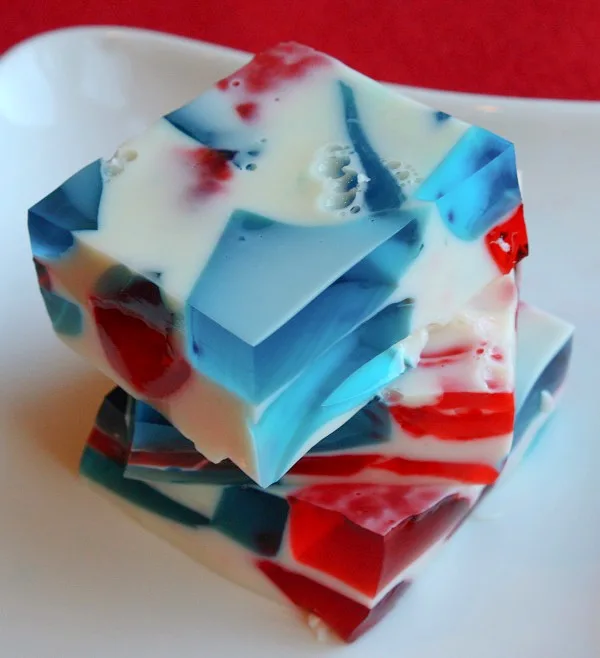 slices of patriotic jello stacked on white plate