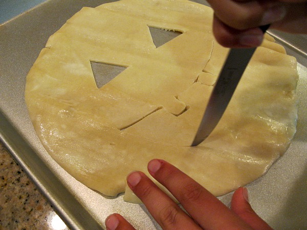 Cutting a Jack O Lantern out of pie crust