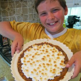 RecipeBoy holding s'mores pie