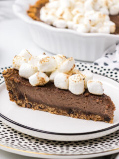 slice of S'Mores Pie in a white plate