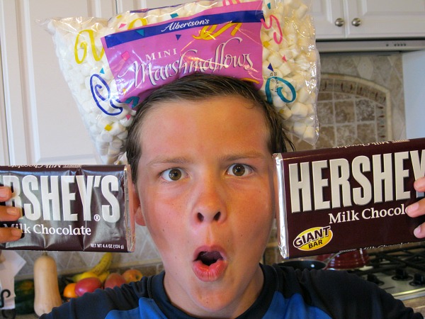 RecipeBoy with Marshmallows on head and hersheys bars