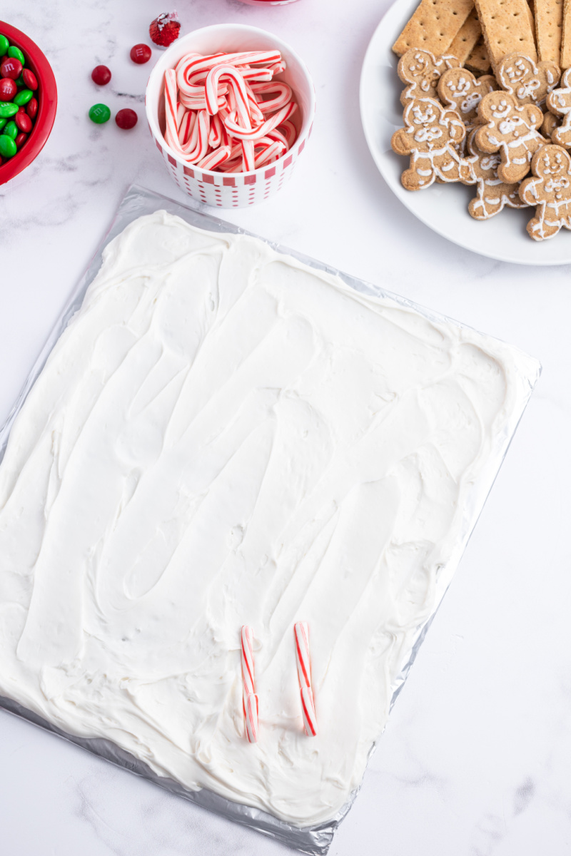 candy canes on frosted board