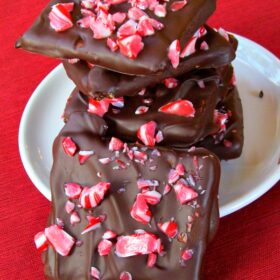 chocolate dipped candy cane grahams in a stack