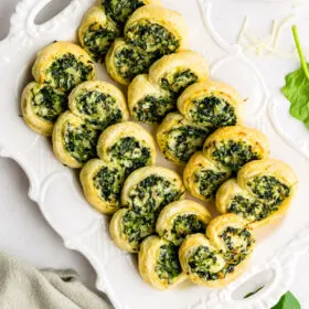 spinach palmiers on a white platter