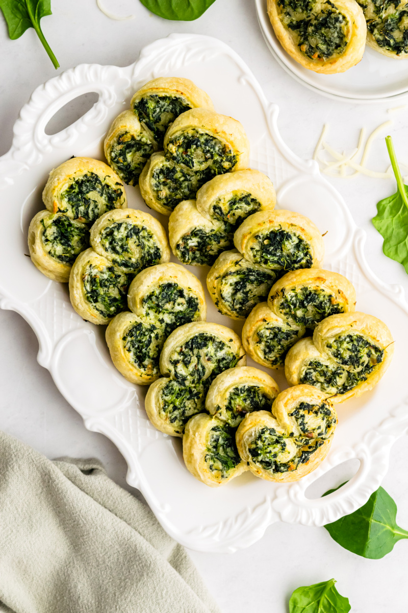 spinach palmiers on a white platter