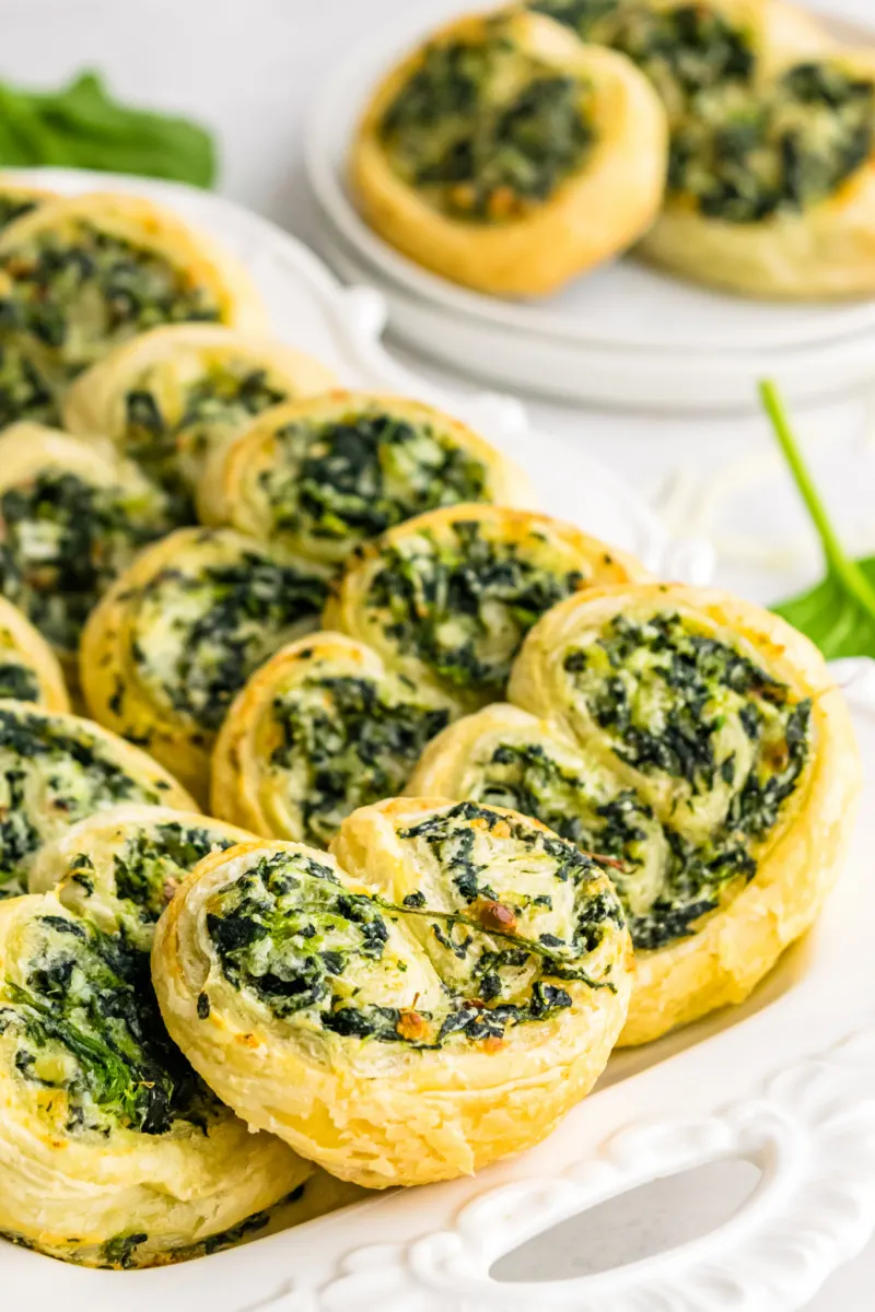 spinach palmiers on a white platter