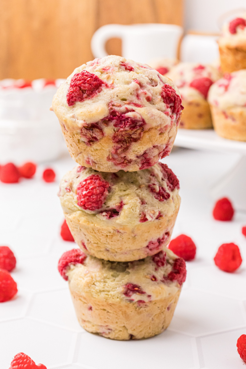 stack of three raspberry muffins
