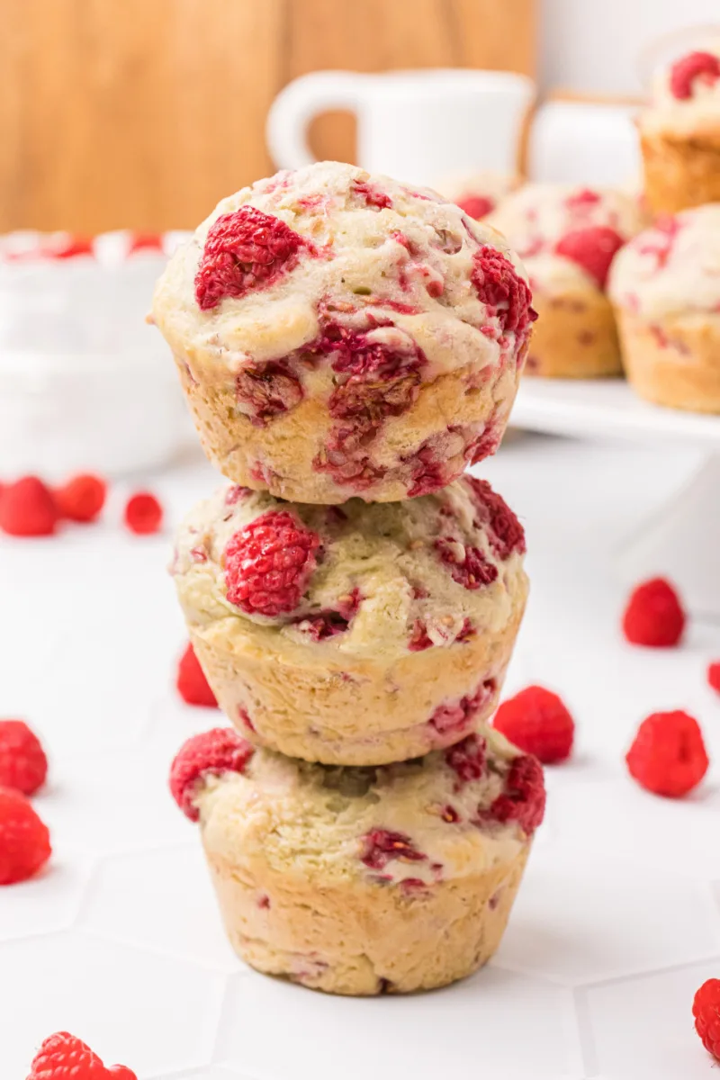 stack of three raspberry muffins