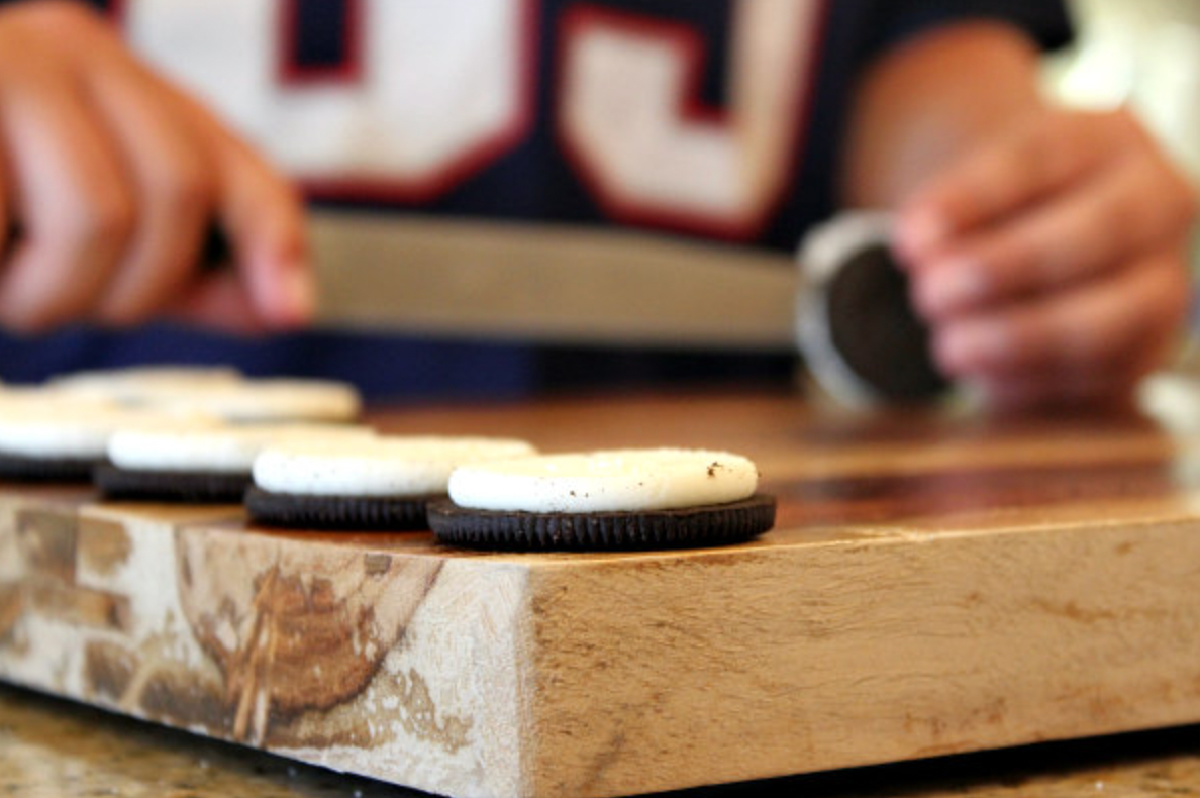 little hands taking oreos apart