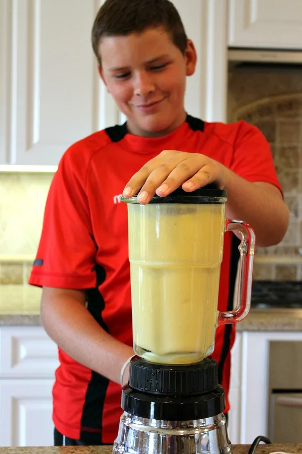 recipeboy making an orange julius in a blender