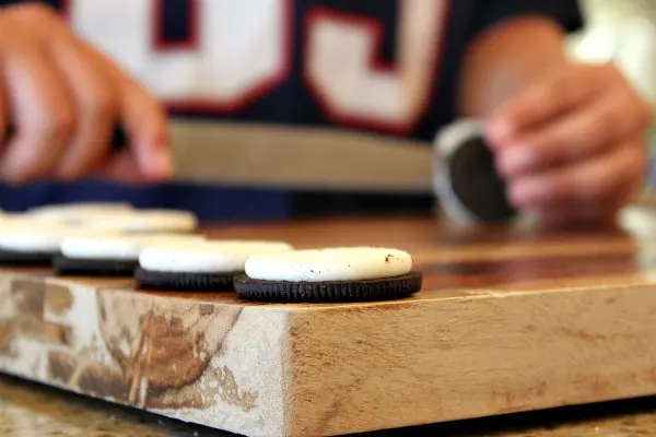 Making peanut butter cup stuffed oreos