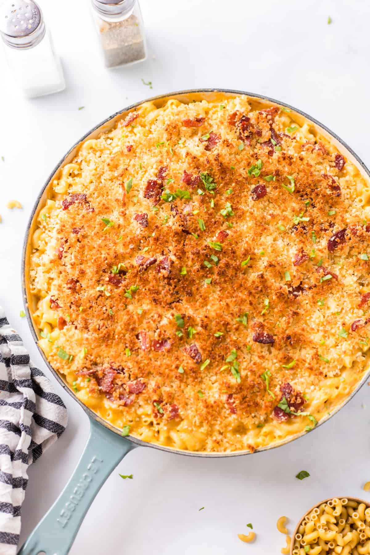 Recipe for Skillet Macaroni and Cheese is super cheesy, topped with bread crumbs, bacon and more cheese and baked until bubbly. skillet macaroni and cheese