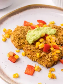 tortilla crusted turkey cutlets on plate