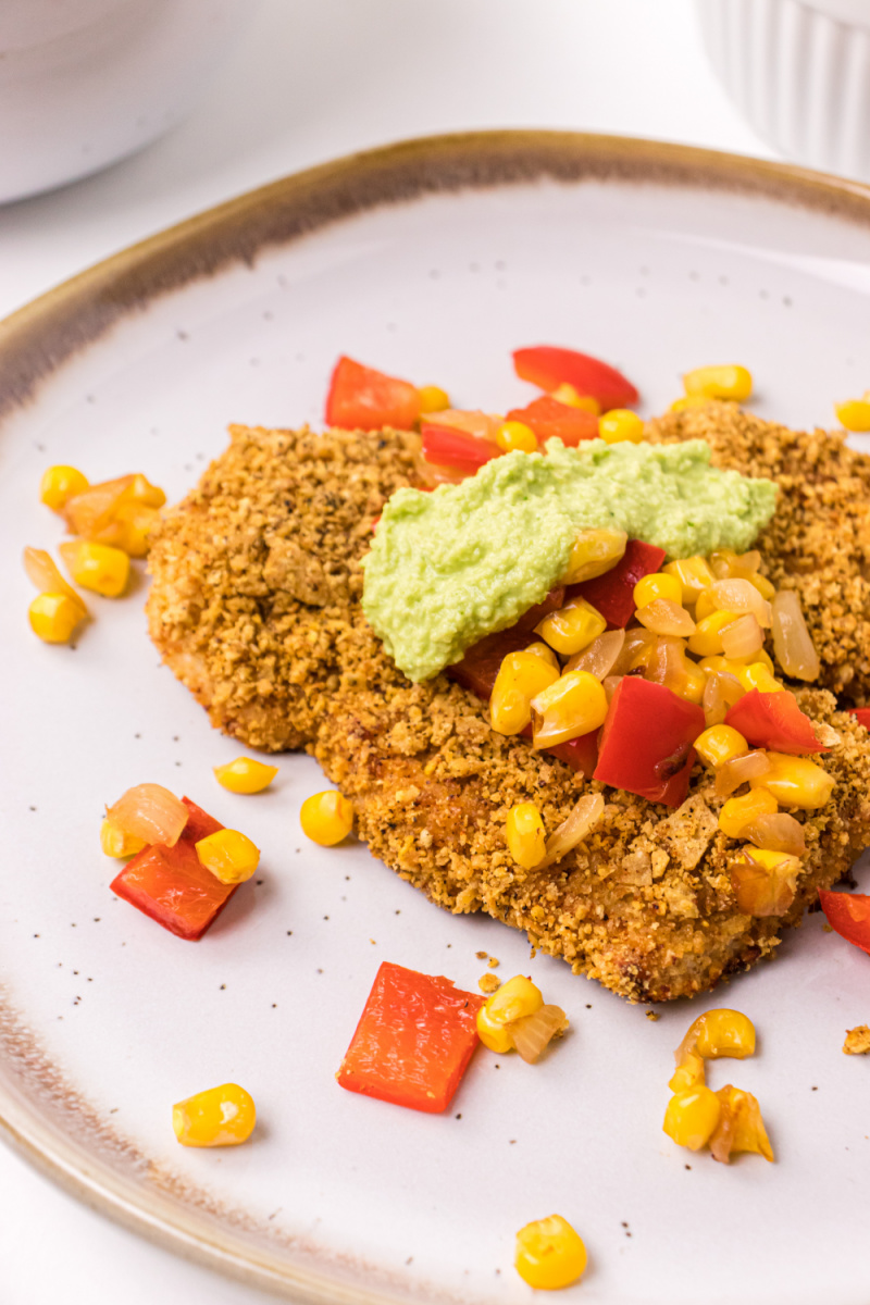 tortilla crusted turkey cutlets on plate