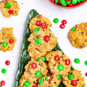 Christmas Monster Cookies on a green tree platter