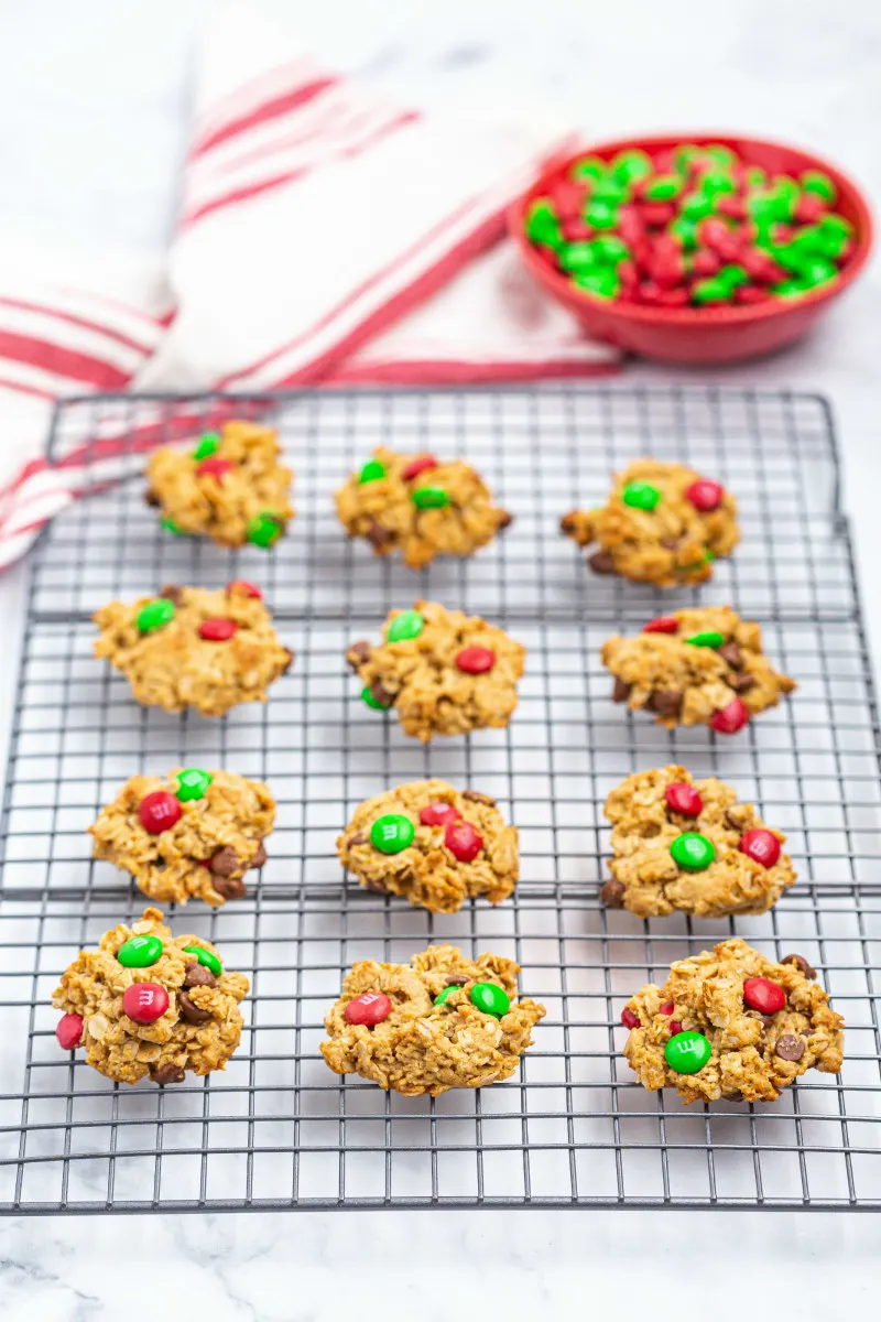 christmas monster cookies on cooling rack