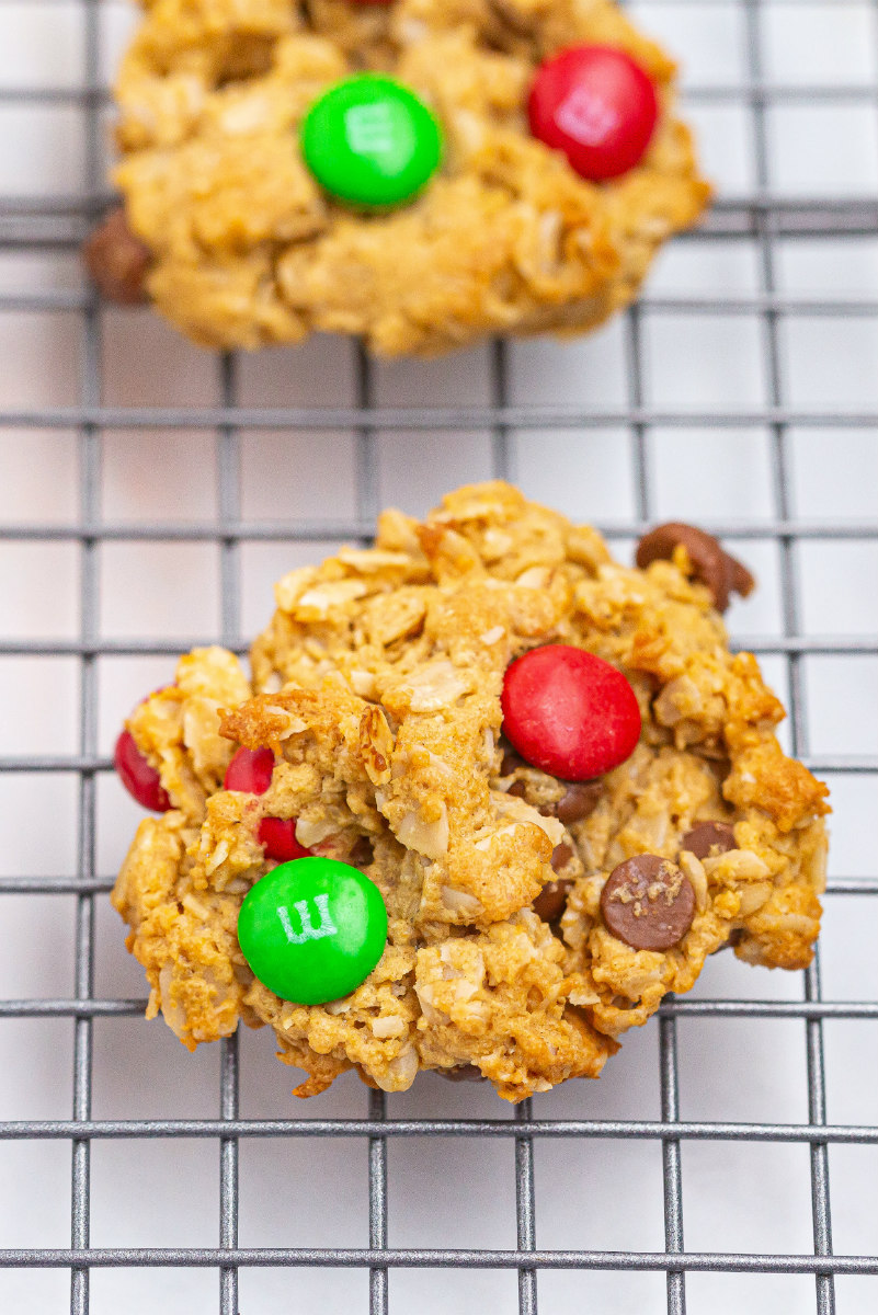 christmas monster cookies on cooling rack