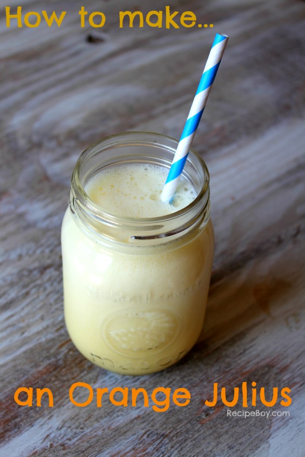 jar of orange julius with a blue and white paper straw