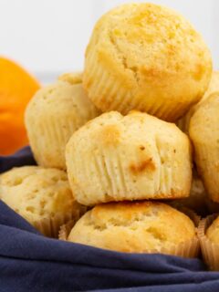 stack of orange ricotta muffins