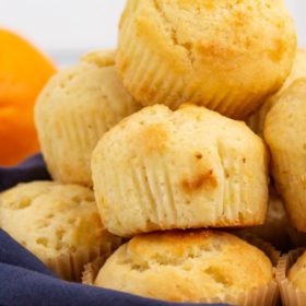 stack of orange ricotta muffins