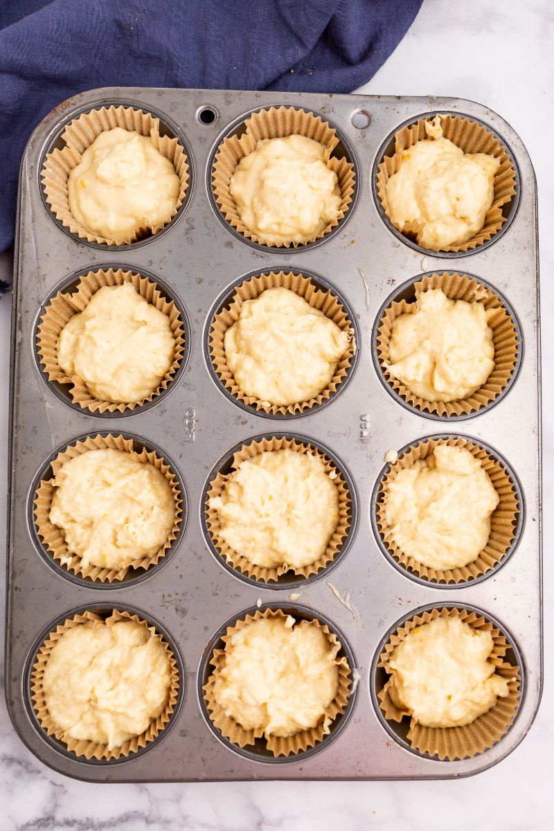 muffin batter in a muffin tin