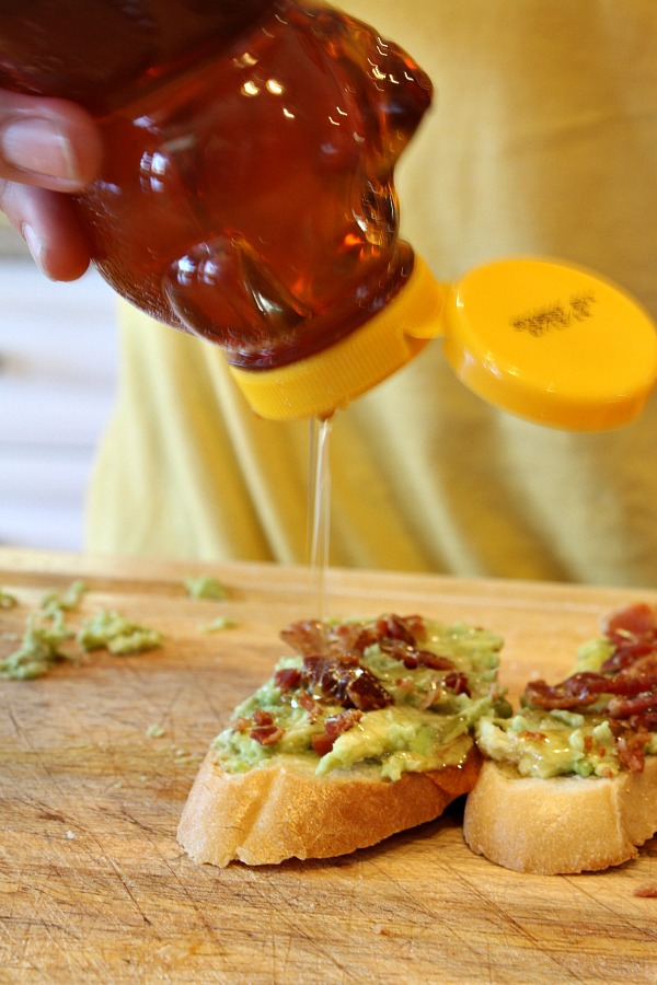 Avocado Bacon Toast topped with Honey