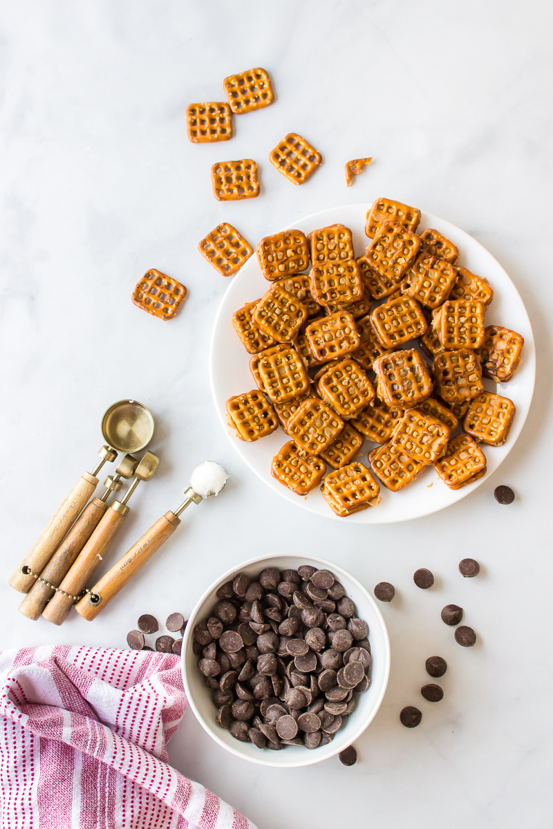 ingredients displayed for making chocolate covered peanut butter pretzels