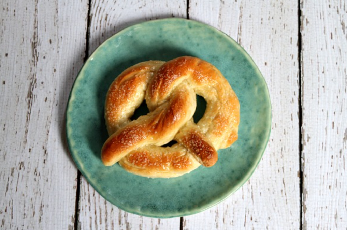 homemade soft pretzel on plate