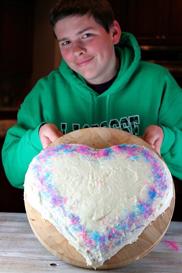 RecipeBoy holding a heart shaped cake