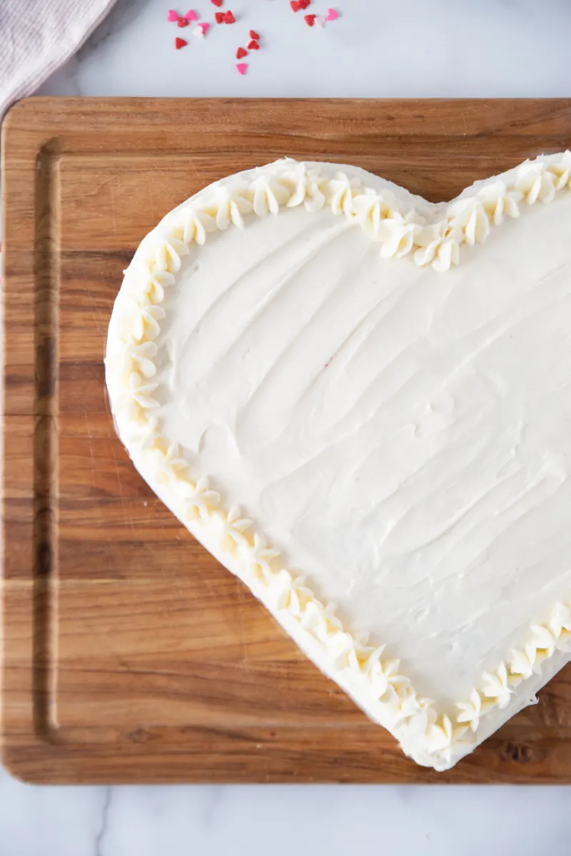 white frosting on a heart shaped cake