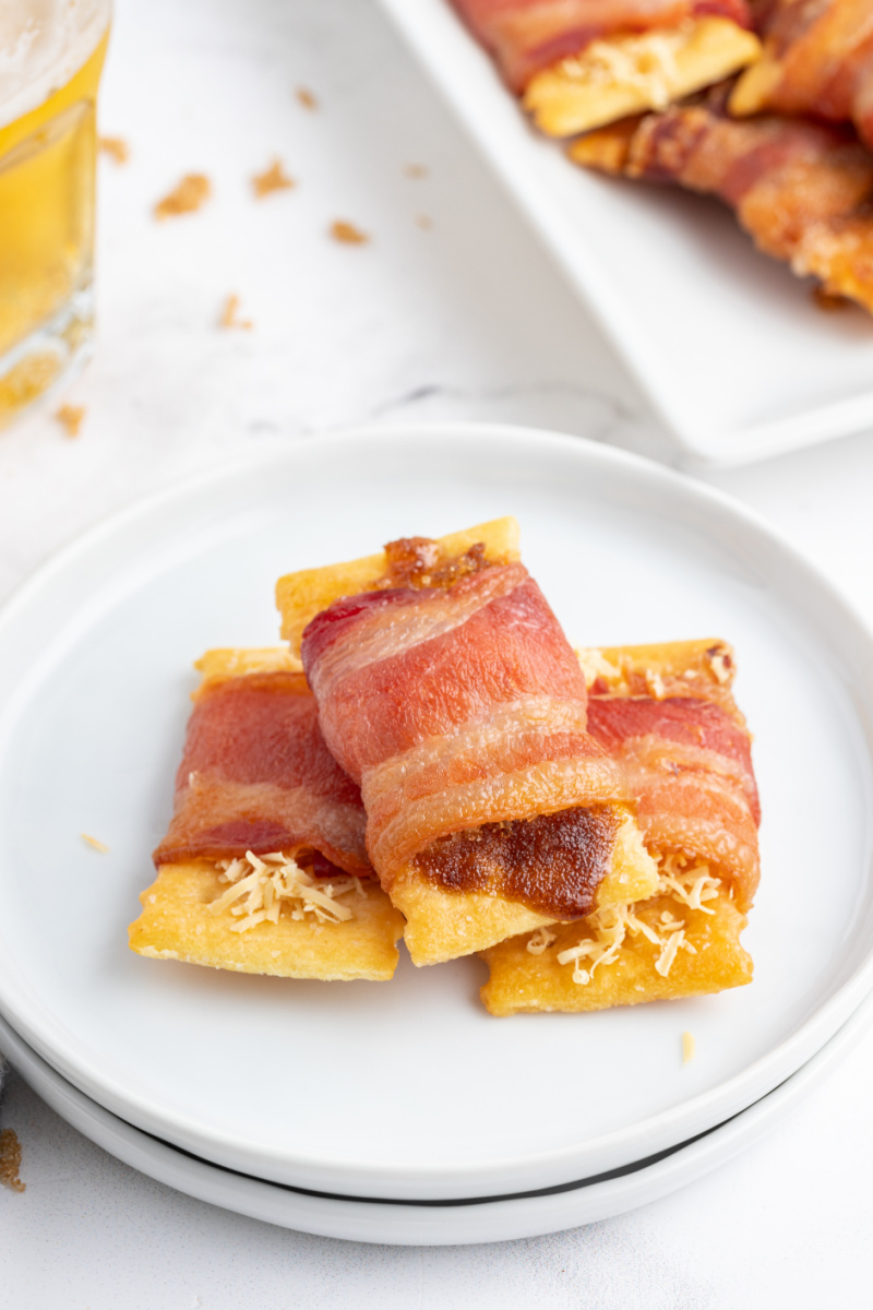 three bacon crackers on a plate