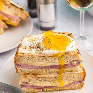 croque madame with broken egg on top