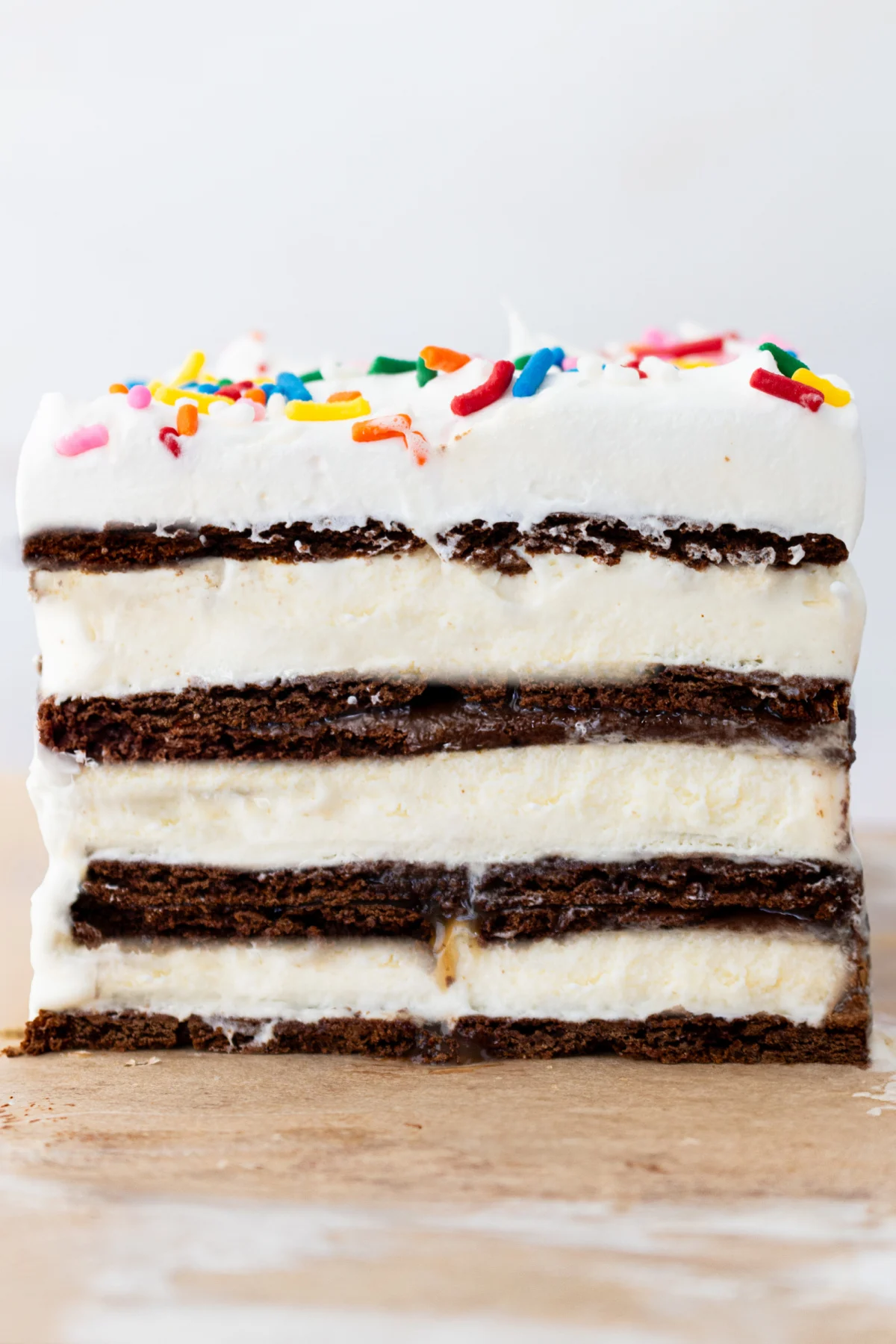 15 Minute Easy Ice Cream Cake recipe using ice cream sandwiches! recipe from RecipeBoy.com slice of ice cream sandwich cake