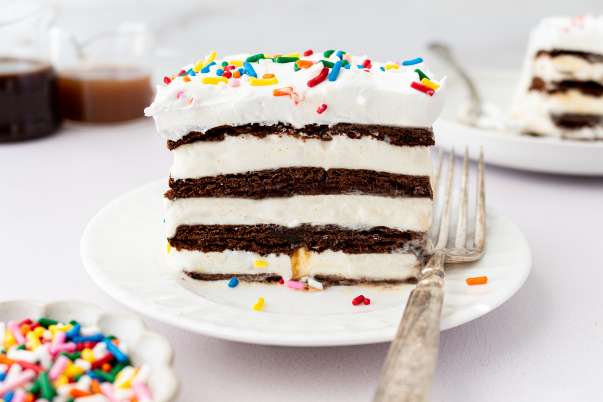 slice of ice cream sandwich cake on plate with fork