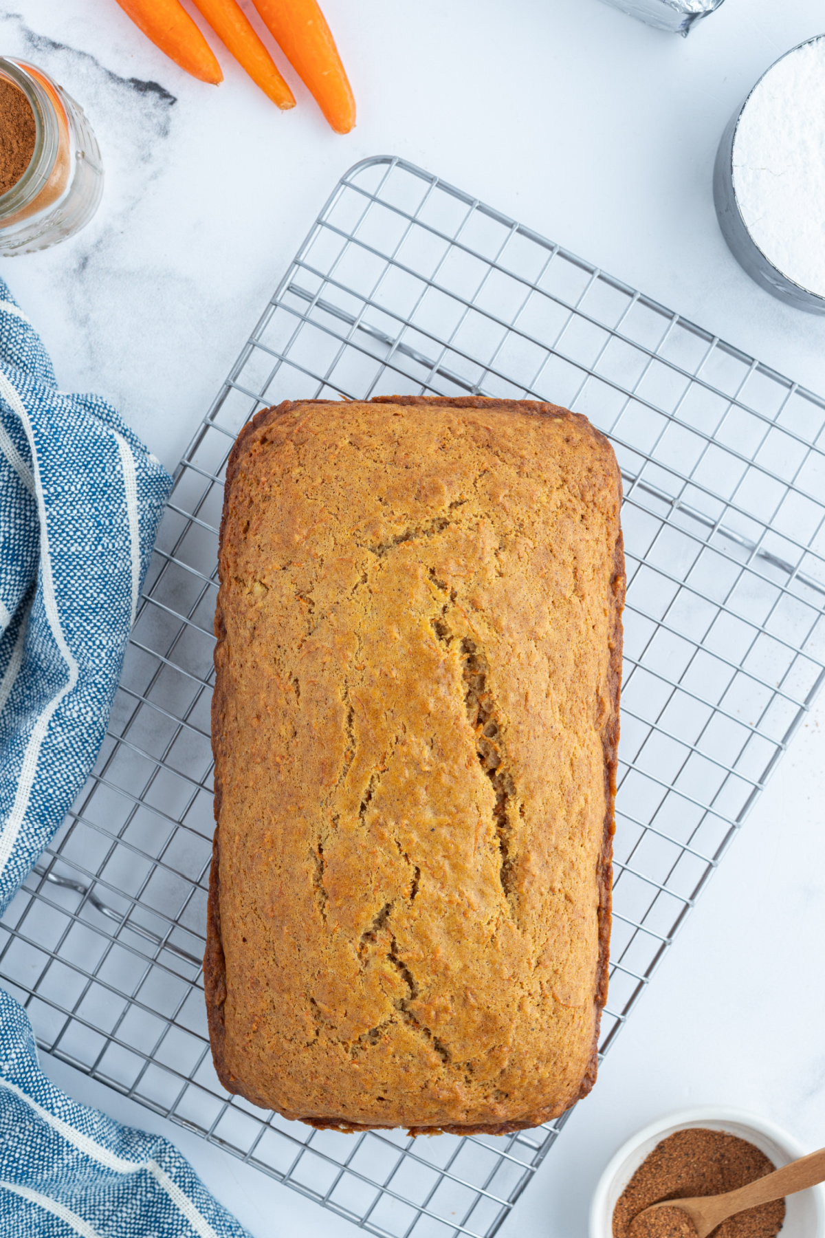 overhead shot of carrot loaf cake on cooling rack