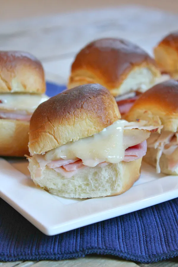 GameDay Sliders Recipe - from RecipeBoy.com (otherwise known as fancy Chicken Cordon Bleu Sliders!) Easy recipe for awesome football game day Sliders)