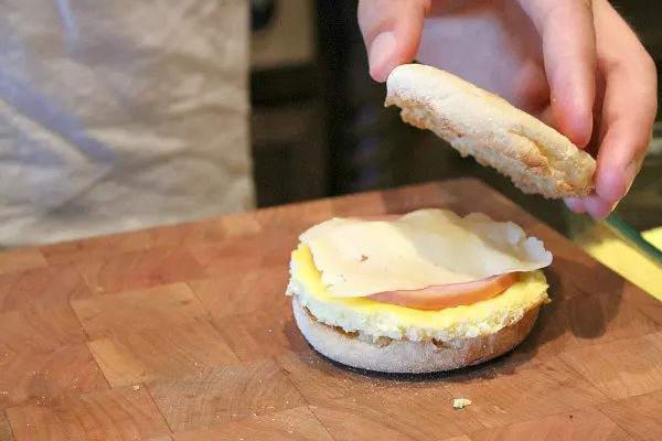 Easy to Make Ahead Freezer Breakfast Sandwiches - a super quick solution for eating a quick breakfast or grab and go on busy mornings! Recipe from RecipeBoy.com