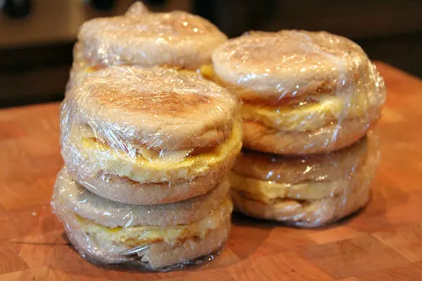 Easy to Make Ahead Freezer Breakfast Sandwiches - a super quick solution for eating a quick breakfast or grab and go on busy mornings! Recipe from RecipeBoy.com