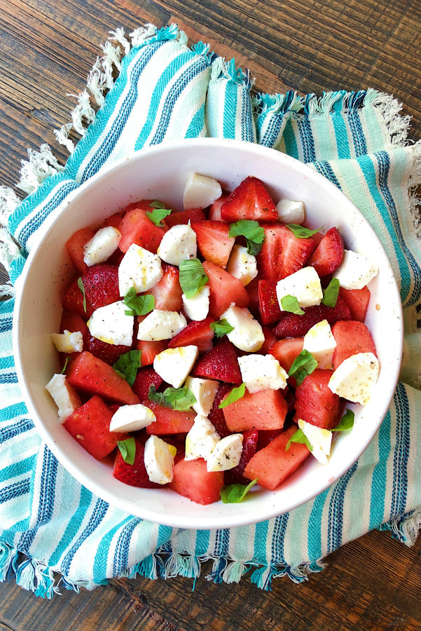 watermelon strawberry caprese salad with fresh basil
