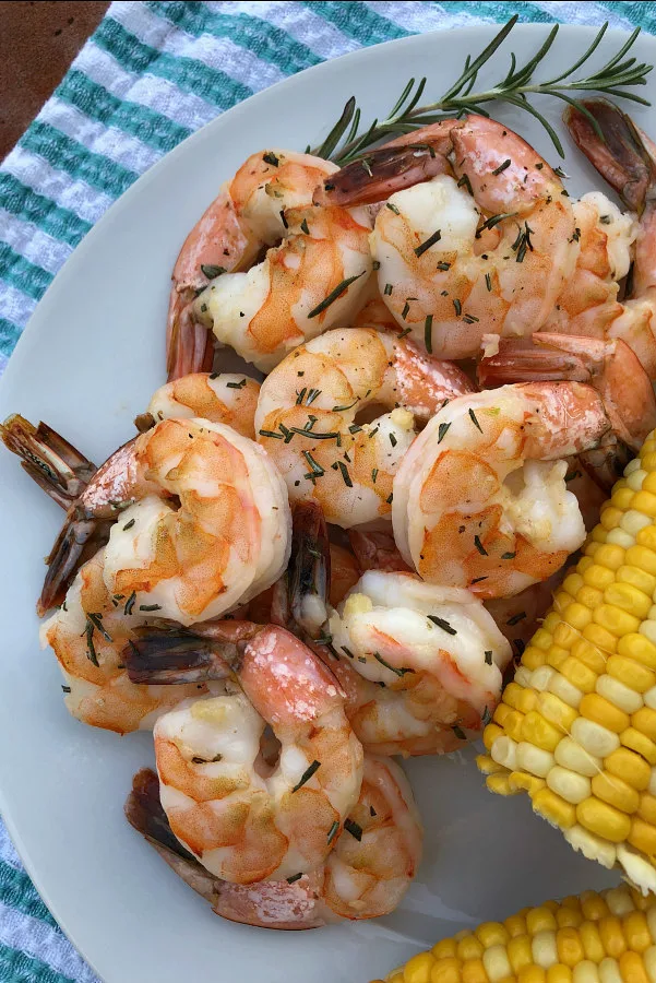 Easy Baked Garlic Shrimp served with corn on the cob