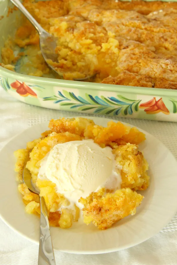 serving of 3 ingredient peach cobbler with ice cream