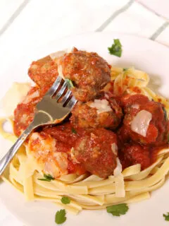 Easy Homemade Meatballs served over pasta