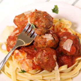 Easy Homemade Meatballs served over pasta