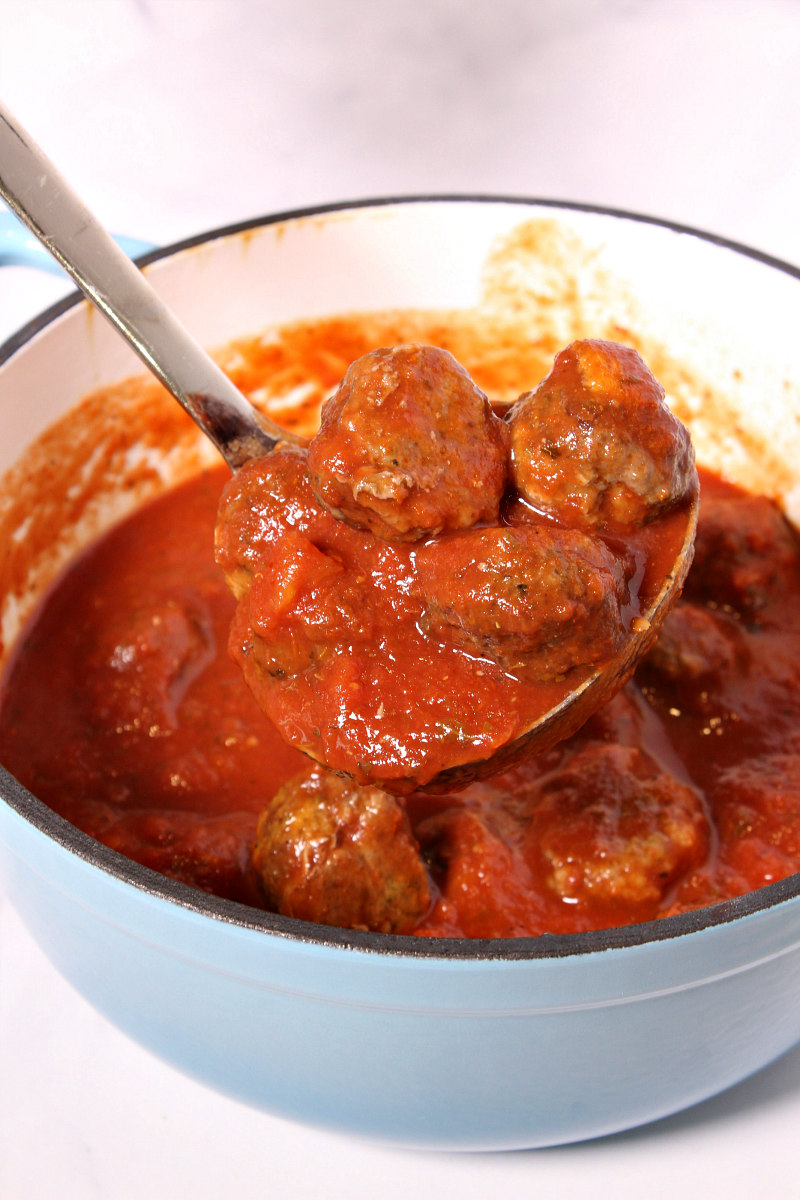 Easy Homemade Meatballs in pot of marinara