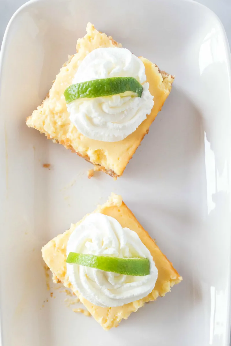overhead shot of key lime bars on a white plate