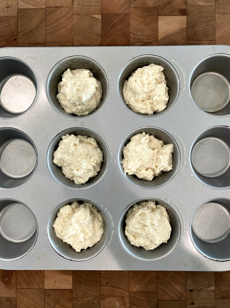 No Yeast Dinner Rolls dough in muffin pan ready for the oven