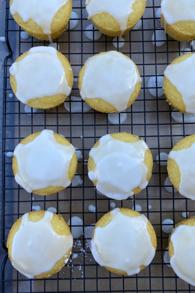 overhead shot of glazed lemon muffins on a rack