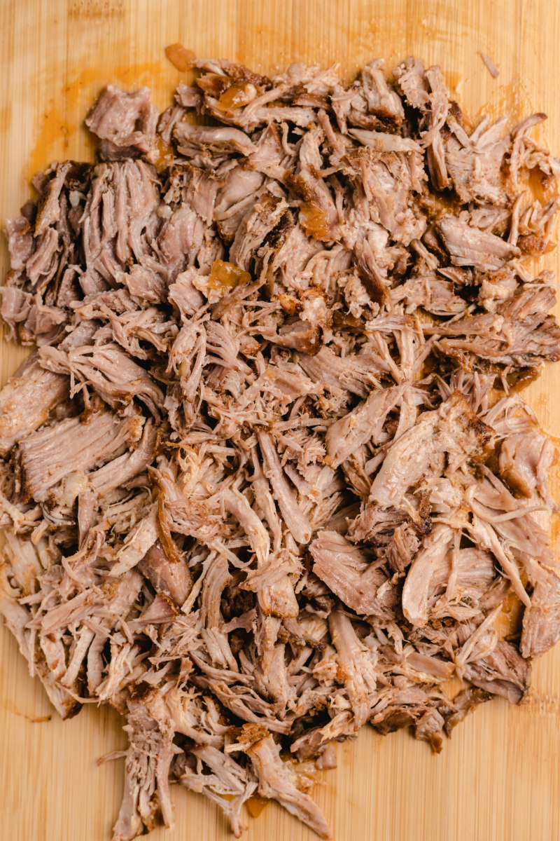 pulled pork on a cutting board