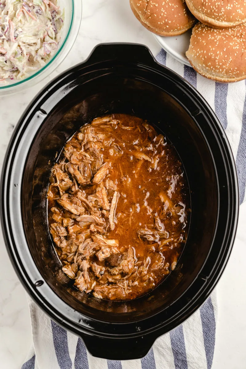 pulled pork in a slow cooker insert