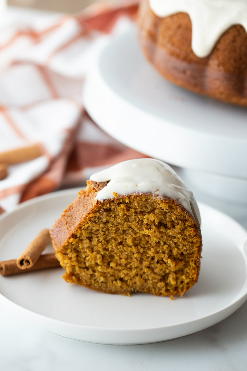 slice of pumpkin bundt cake on a plate